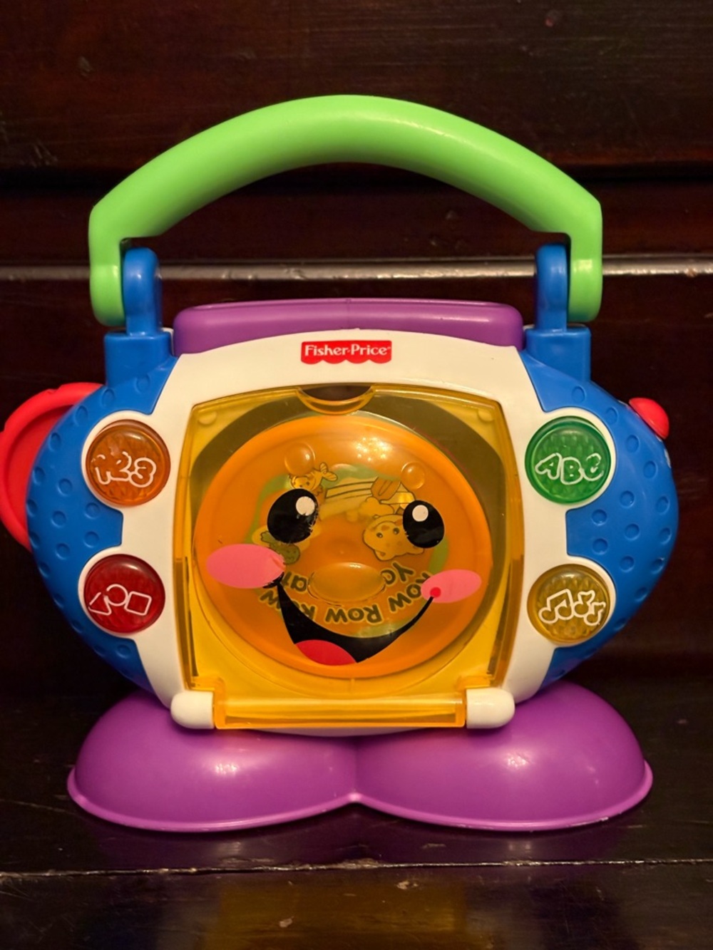 Fisher-Price Musical Activity Player Toy - Green Handle, Purple Base, Blue Sides